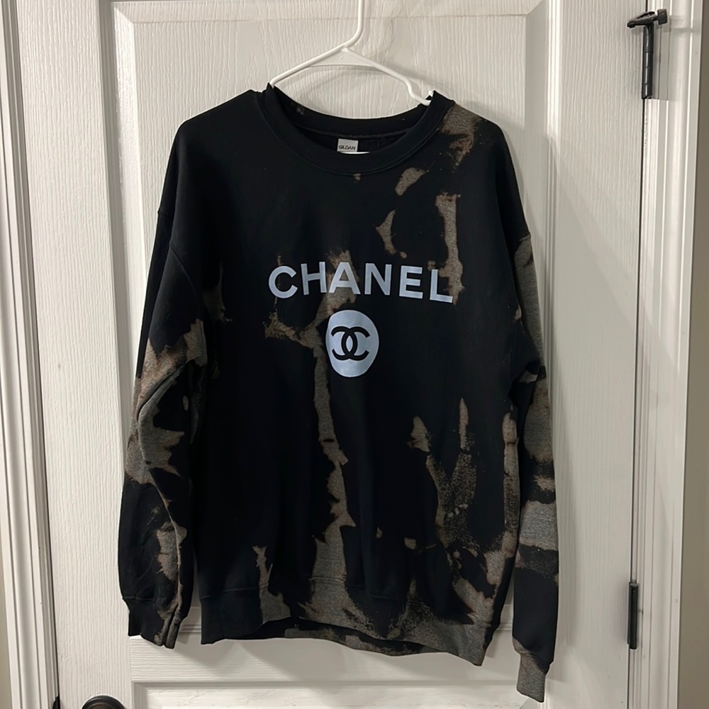 Gildan crewneck with Chanel on the front women’s size Large.